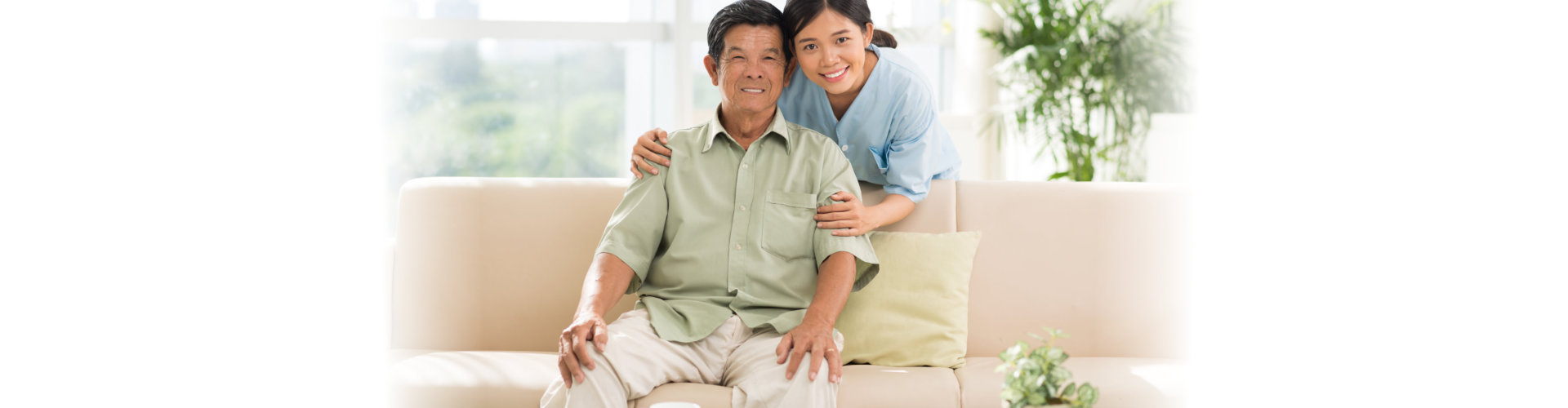 young woman and old man smiling